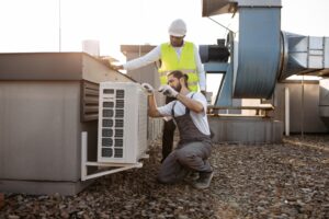 certified HVAC professionals Inspecting the system